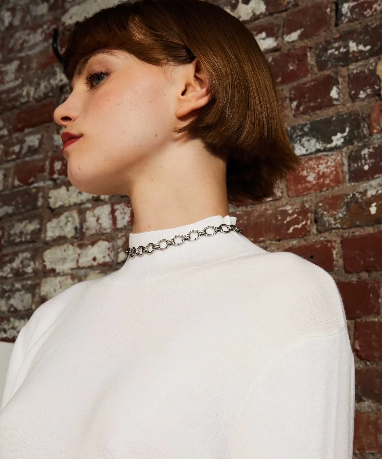 Rodier Maglia collo alto bianco ecru costine minimal